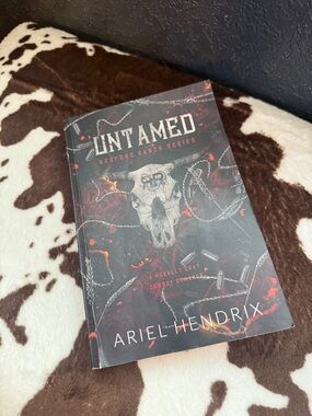 Untamed by Ariel Hendrix - Black & Red Paperback Novel